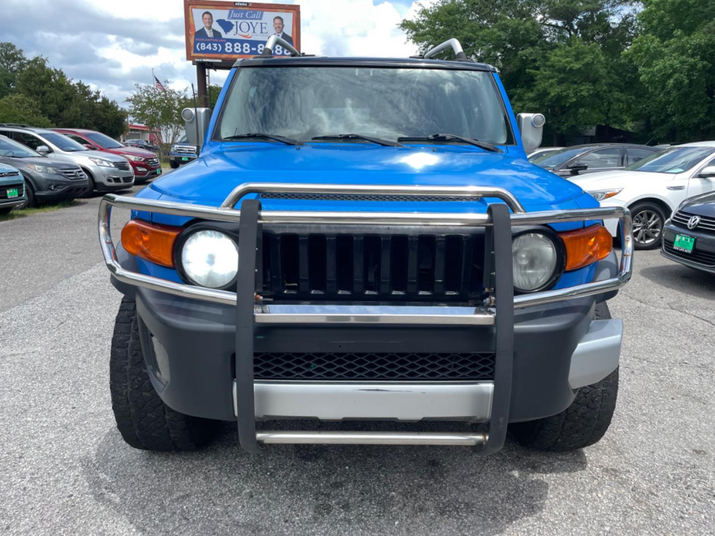 2007 BLUE TOYOTA FJ CRUISER BASE (JTEZU11F970) with an 4.0L engine, Automatic transmission, located at 5103 Dorchester Rd., Charleston, SC, 29418-5607, (843) 767-1122, 36.245171, -115.228050 - Local Trade-in with CD/AUX/Sat/Bluetooth, Power Windows, Power Locks, Power Mirrors, All-weather Flooring, Rear Power Inverter, Keyless Entry, Tow Package. Clean Inside & Out!! 222k miles Located at New Life Auto Sales! 2023 WINNER for Post & Courier's Charleston's Choice Pre-owned Car Dealer AND 2 - Photo#1